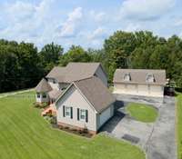 Total 6-Car Garage (2 Attached & 4 Detached)