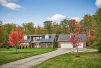 Beautiful home on 6+ wooded acres!