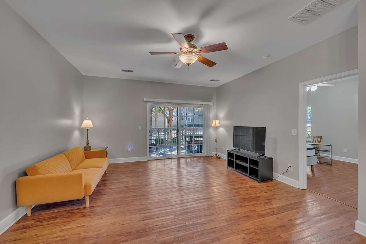 You'll enjoy the open layout with a Patio & easy ground access!