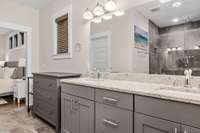 Ensuite primary bathroom with expansive double vanities for plenty of counter space
