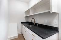 Generous coffee bar area in pantry.