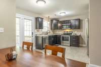 Kitchen and dining with Patio access