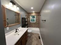 Full Bath: This bathroom provides ample room for all your daily needs. A large sink, shower/tub combo, and lots of room for storage make this full bath everything you're looking for.