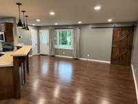 From the bar, enjoy all the nature from the huge picture window.