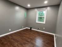 Bedroom 2: Picture waking up to views of the sun rising over these majestic evergreen trees.