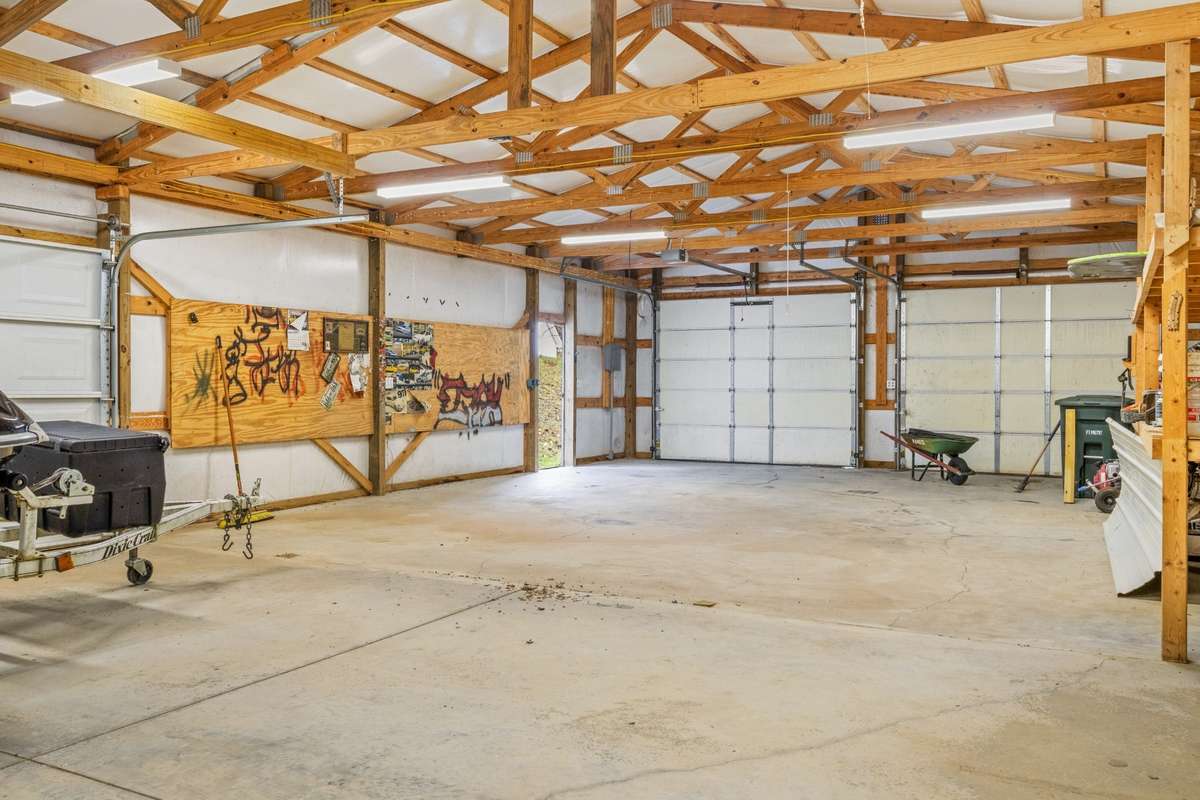 Detached building features side door and garage door