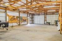 Detached building features side door and garage door