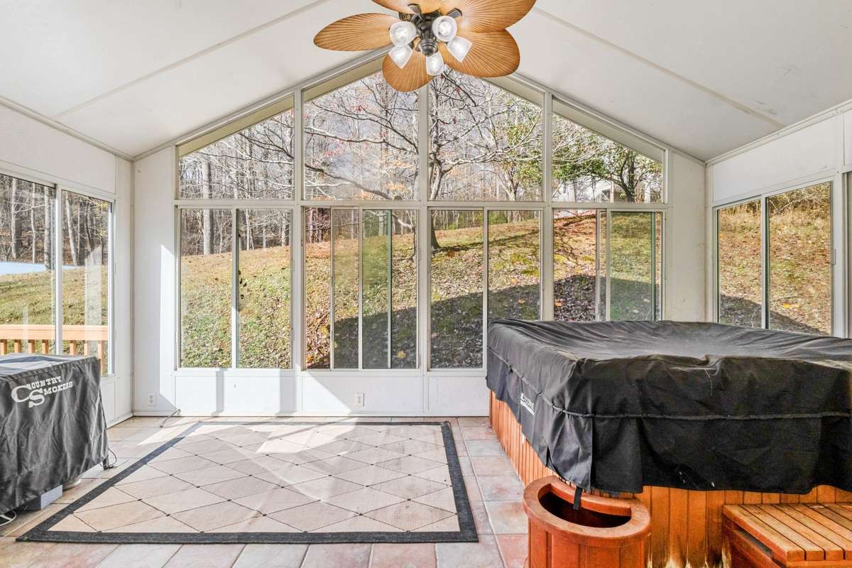 Hot tub in sunroom remains