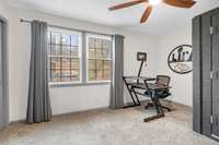 Bedroom 3 with large windows and a flexible space for an office or bedroom.