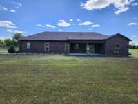 12x20 covered back porch with gas to hook up grill.