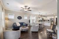 Another view of living and dining area and kitchen