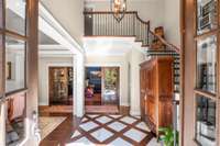 Two story entry foyer with marble inlay
