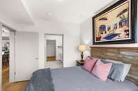 Bedroom #2 has custom bedframe, side tables & lamps, and a chest of drawers. Artwork is negotiable.