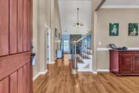 Hardwood Flooring Welcomes You in and Continues into the Formal Dining Room, Living Room, Kitchen and on the Stairs!