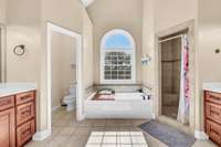 Amazing Primary Bathroom Features a Tile Shower, Jetted Tub, 2 Separate Vanities and a Toilet Closet!