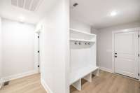 Mud bench right as you enter from garage provides lots of storage and a great drop zone!