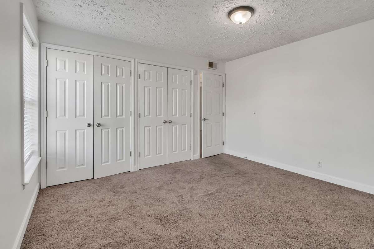 The bedroom has two nice sized closets