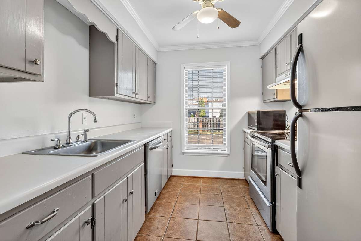 Light filled kitchen with tile floor