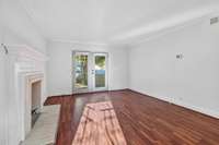 Freshly painted with laminate flooring and a fireplace!