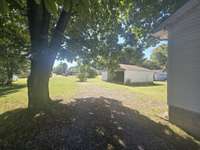 A large backyard -shed is great for storage.