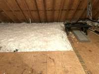 Added floored attic storage area and added insulation for comfort and savings