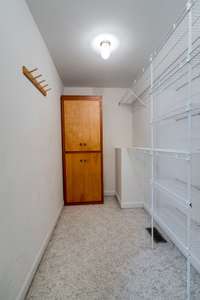 Walk in closet in primary suite