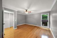 Extra large 3rd bedroom with walk in closet.  Bedrooms 2 & 3 are located on the opposite end of the house from the primary suite. Notice the adjustable blackout shades with up/down feature.