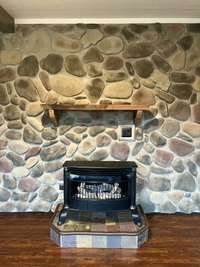 2nd gas fireplace located in the sunroom overlooking the pool!