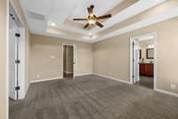 Another view of primary bedroom suite.