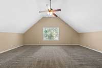 This is the large room of the primary suite.  It can be the bedroom area, or a second den/living area, or office.  Just a great space to make it fit your needs.