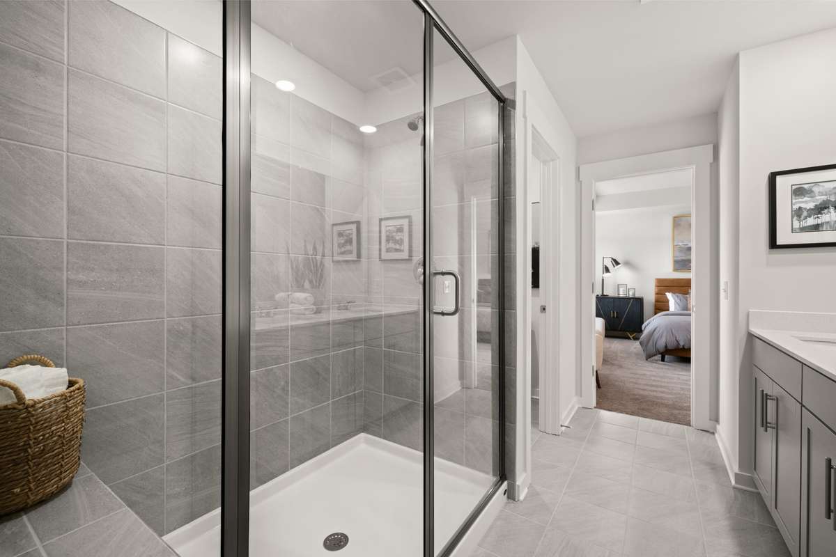 Primary shower with bench and tile surround