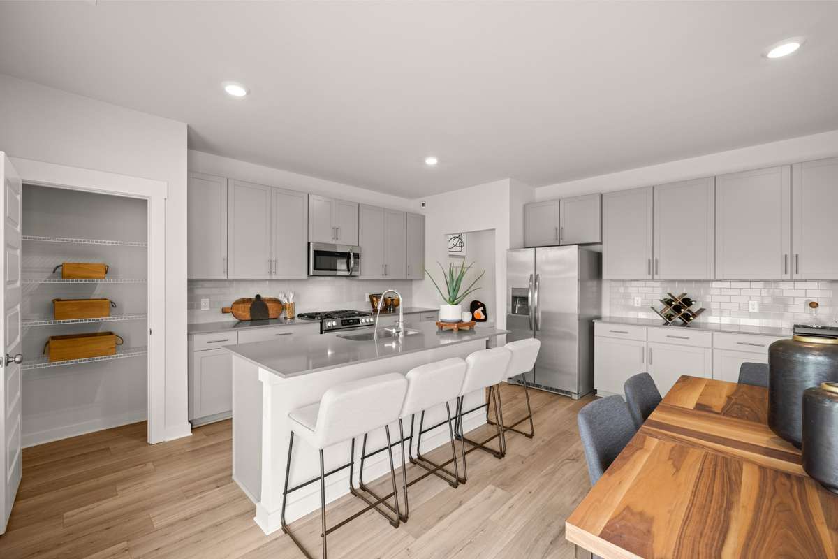 Island for casual meals and a pantry to boot!