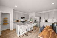 Island for casual meals and a pantry to boot!