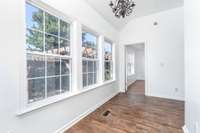 Doorway to masterbedroom off sunroom on right side of the home. Opposite kitchen