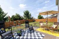 This great patio space allows for indoor and outdoor living + you have a fenced in yard!