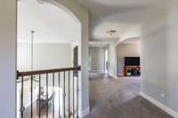 All the arches and curved drywall edges add a sophisticated element to the home.