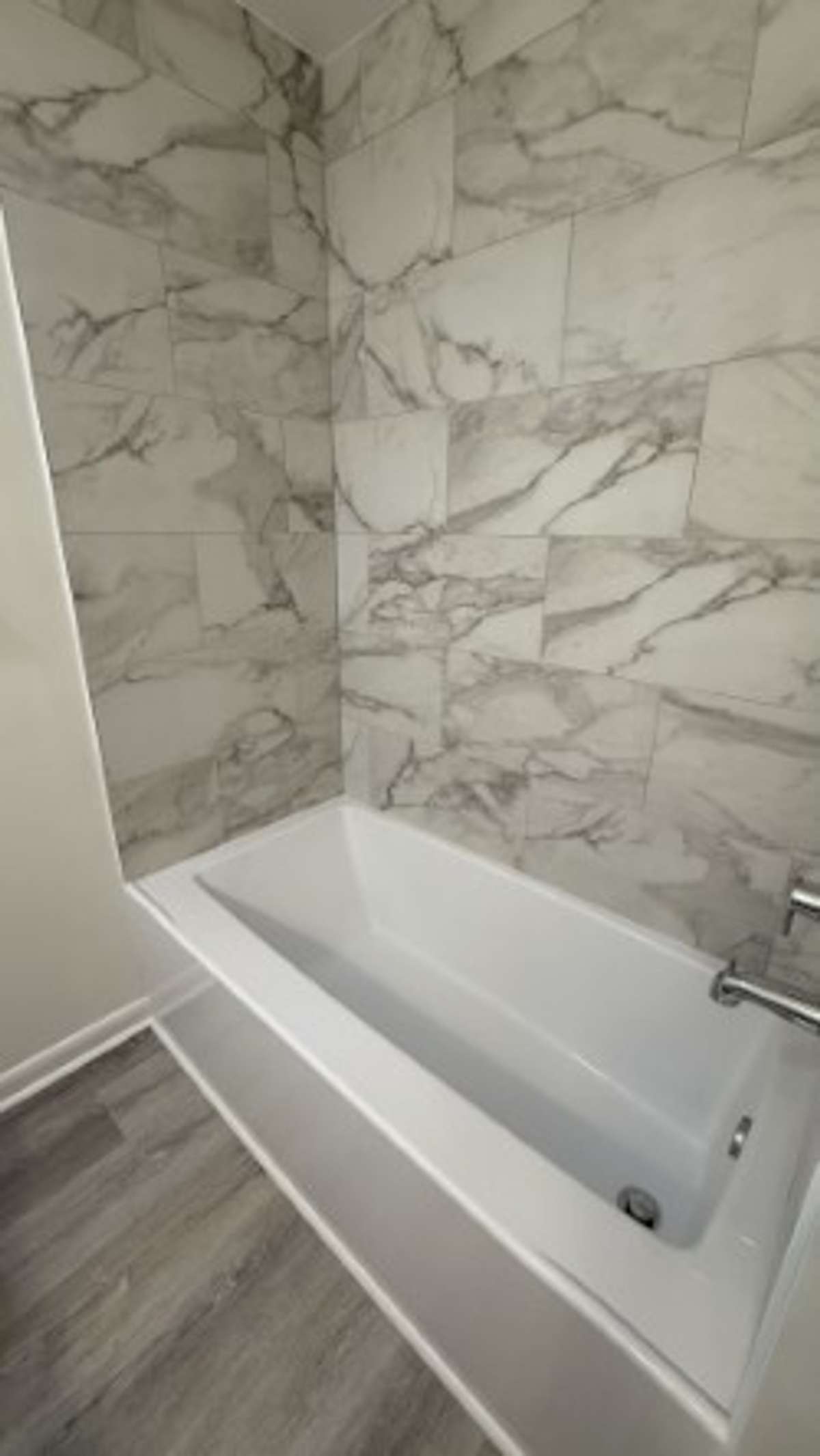 New Tub with New Ceremic Tile Walls,