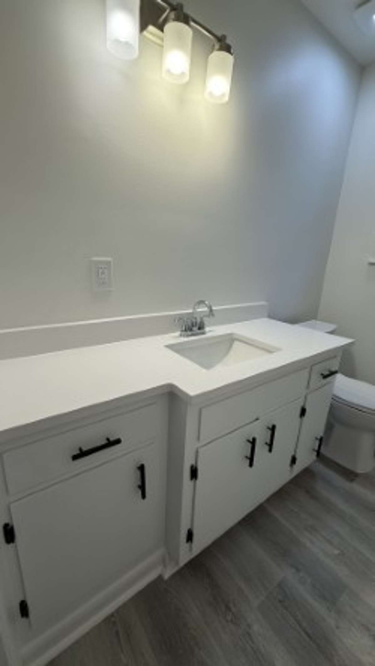 Main Level of home Full Bathroom with New Vanity, Shower/Tub Combo,Flooring and New Paint.