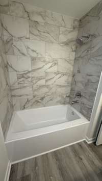 New Tub, Cermic Tile, Flooing and all new Painted Walls