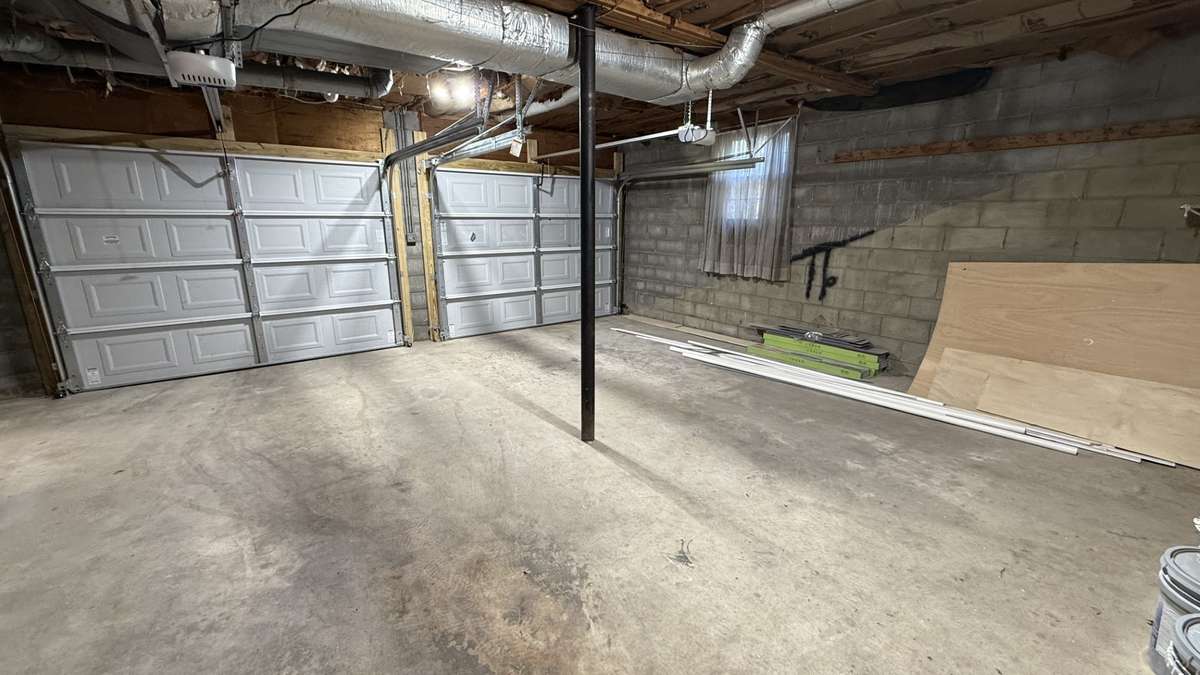 2 Car Garage with New Doors installed in Sept 2025