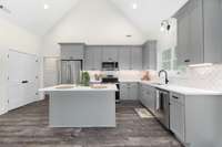 Kitchen boasts walk-in pantry with built in shelving