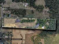 The 20.42 acres is a rectangle and the house sits about 3/4 of the way back on the property. Come and take a look for yourself.