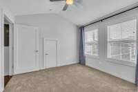 This bedroom offers two large walk-in closets.