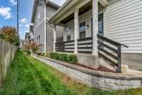 One of the few homes in this community that has a back porch and backs up to HOA-maintained greenspace.
