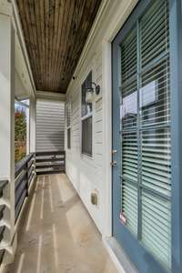 Back porch large enough for grill and seating.