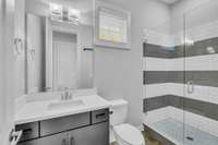 1st floor full bath with walk-in shower.