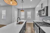 Breakfast nook leads into the kitchen.