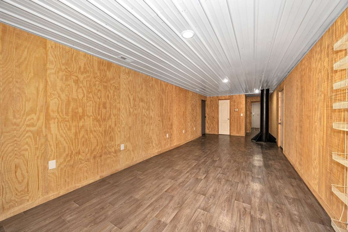 Great Room- vinyl flooring, recessed lighting