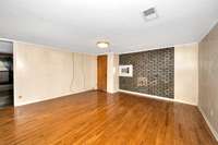 Living Room- wood flooring, crown molding
