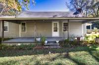 Front of house- Covered front porch with home entry